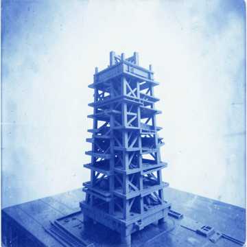 15 — THE MACHINE BUILDS ITS RACK