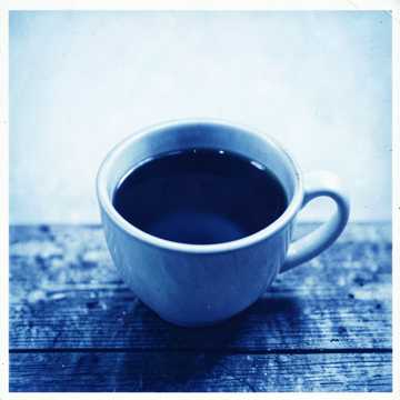Half-Full Coffee Cup